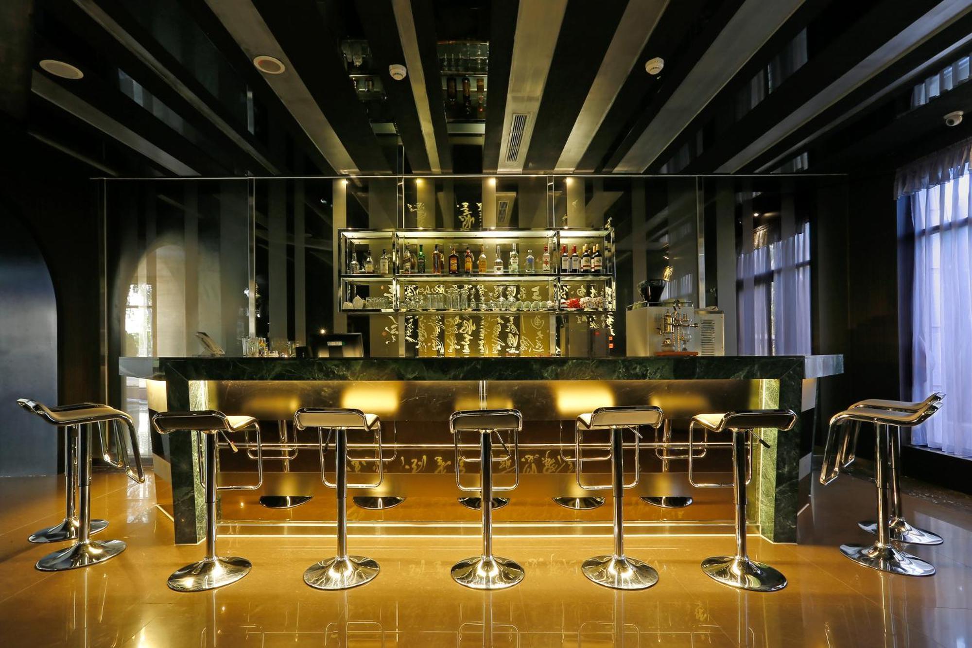 Golden Tulip - Aesthetics Hotel Zhunan Bagian luar foto