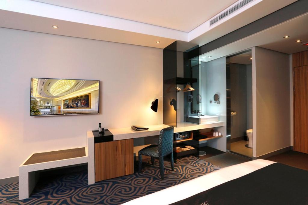 Golden Tulip - Aesthetics Hotel Zhunan Bagian luar foto