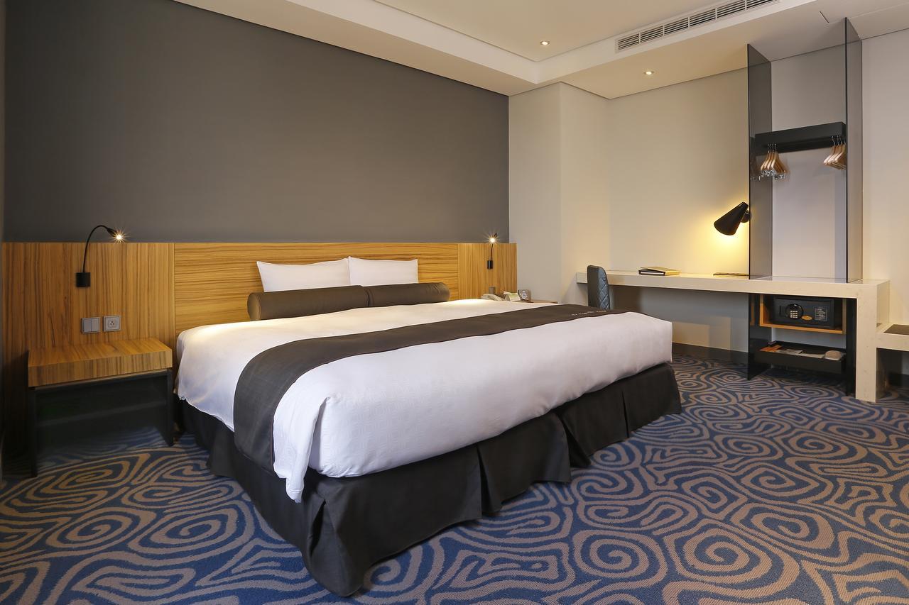 Golden Tulip - Aesthetics Hotel Zhunan Bagian luar foto