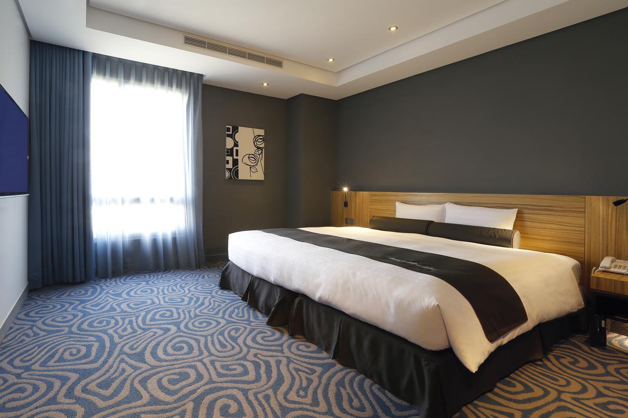 Golden Tulip - Aesthetics Hotel Zhunan Bagian luar foto