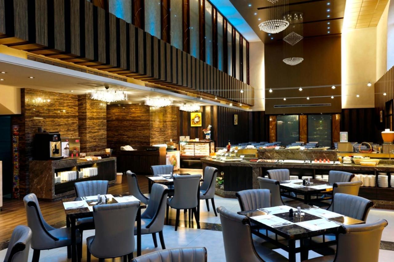 Golden Tulip - Aesthetics Hotel Zhunan Bagian luar foto