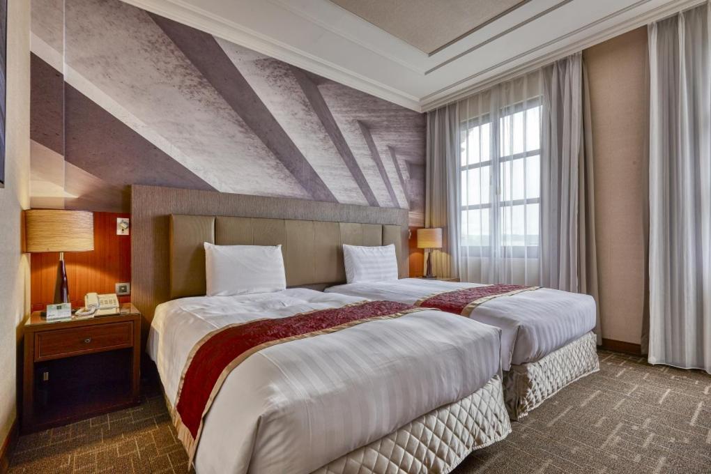 Golden Tulip - Aesthetics Hotel Zhunan Bagian luar foto